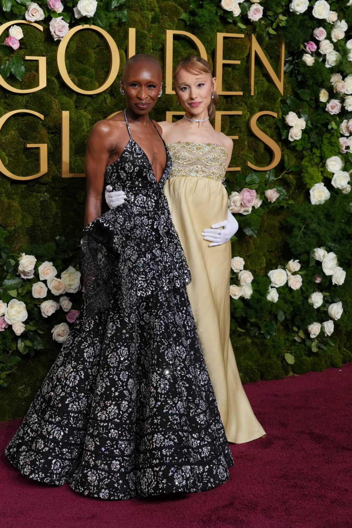 Cynthia Erivo, left, in Louis Vuitton and Ariana Grande in vintage Givenchy