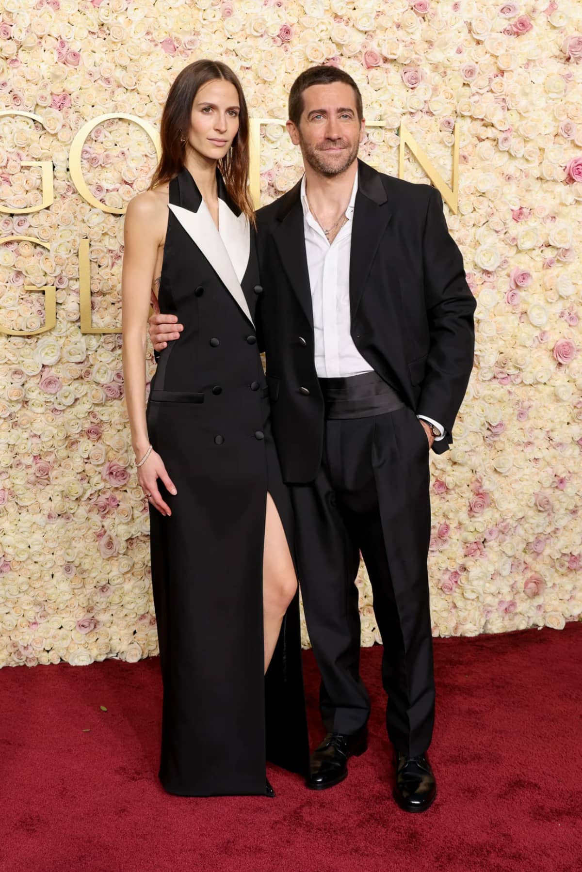 Jeanne Cadieu's black-and-white outfit complemented Jake Gyllenhaal's woolen Prada tuxedo