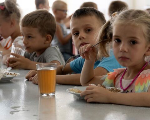 Experts Say Russia’s Mass Abduction of Ukrainian Children Is a War Crime As many as 35,000 Ukrainian children are missing and believed to be held in Russia or areas controlled by Russia, according to experts from Yale University. Families are taking desperate steps to try to bring their children back. Since Russia’s invasion began in February 2022, children have been taken from care homes, battlefields, and even directly from their families. Russia denies demands to return the children and claims Ukraine is “staging a show” about the issue. One mother, Natalia, shared how she rescued her two sons from a children’s camp in Russia after months of being separated. She traveled alone for six days through checkpoints before reuniting with them. The Yale team calls this the largest child abduction in war since World War II, comparing it to Nazi Germany’s forced Germanification of Polish children. Only 1,366 children have so far been returned or escaped. Many children are placed in military camps, foster care, or adopted by Russian families. Rescued children describe being punished for speaking Ukrainian and forced to learn Russian symbols and anthems. Experts warn that if children are placed in orphanages or adopted, it becomes nearly impossible to bring them back to Ukraine. The international criminal court agrees these actions are war crimes. In March 2023, it issued arrest warrants for Russian President Vladimir Putin and children’s commissioner Maria Lvova-Belova for unlawfully deporting Ukrainian children. Ukraine demands the return of all abducted children in any peace talks. Experts say Russia is using the children as bargaining chips in negotiations.