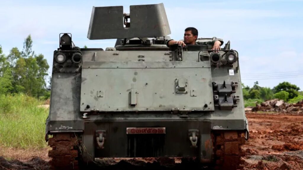 A Thai soldier is seen in an Armoured Personnel Carrier (APC) on a road near the Thailand-Cambodia's border in Thailand's Sisaket province on Tuesday