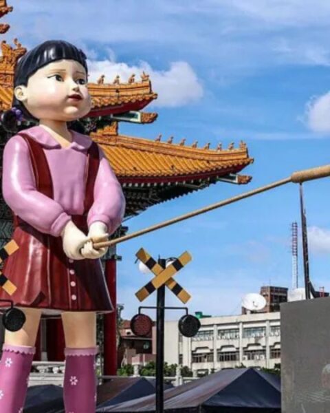 A giant killer doll, among other motifs of Squid Game, were part of a parade celebrating the show's final season