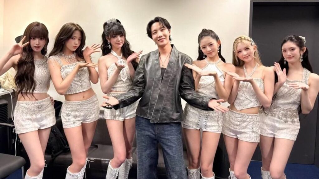 BTS member J-Hope, center, with IVE.