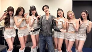 BTS member J-Hope, center, with IVE.