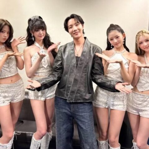 BTS member J-Hope, center, with IVE.