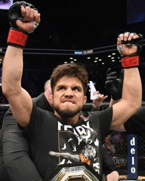 Henry Cejudo celebrating his victory after defeating T.J. Dillashaw at UFC Fight Night 143 on January 19, 2019.