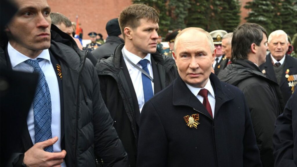 Russian President Vladimir Putin with Bodyguards Around