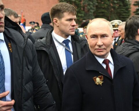 Russian President Vladimir Putin with Bodyguards Around