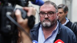 Péchier arriving at the court, accused of causing heart attacks to show off his resuscitation skills.