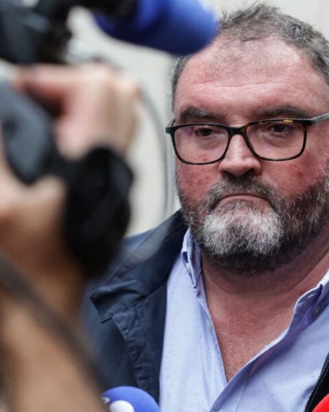 Péchier arriving at the court, accused of causing heart attacks to show off his resuscitation skills.