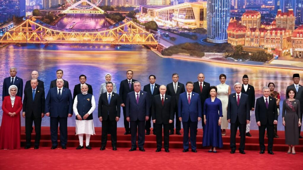 Regional leaders posing for a group photo at a summit in Tianjin, China, on Sunday