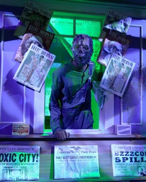 A mutated creature lurks among parkgoers at one of the scare zones at Halloween Horror Nights.A mutated creature lurks among parkgoers at one of the scare zones at Halloween Horror Nights.