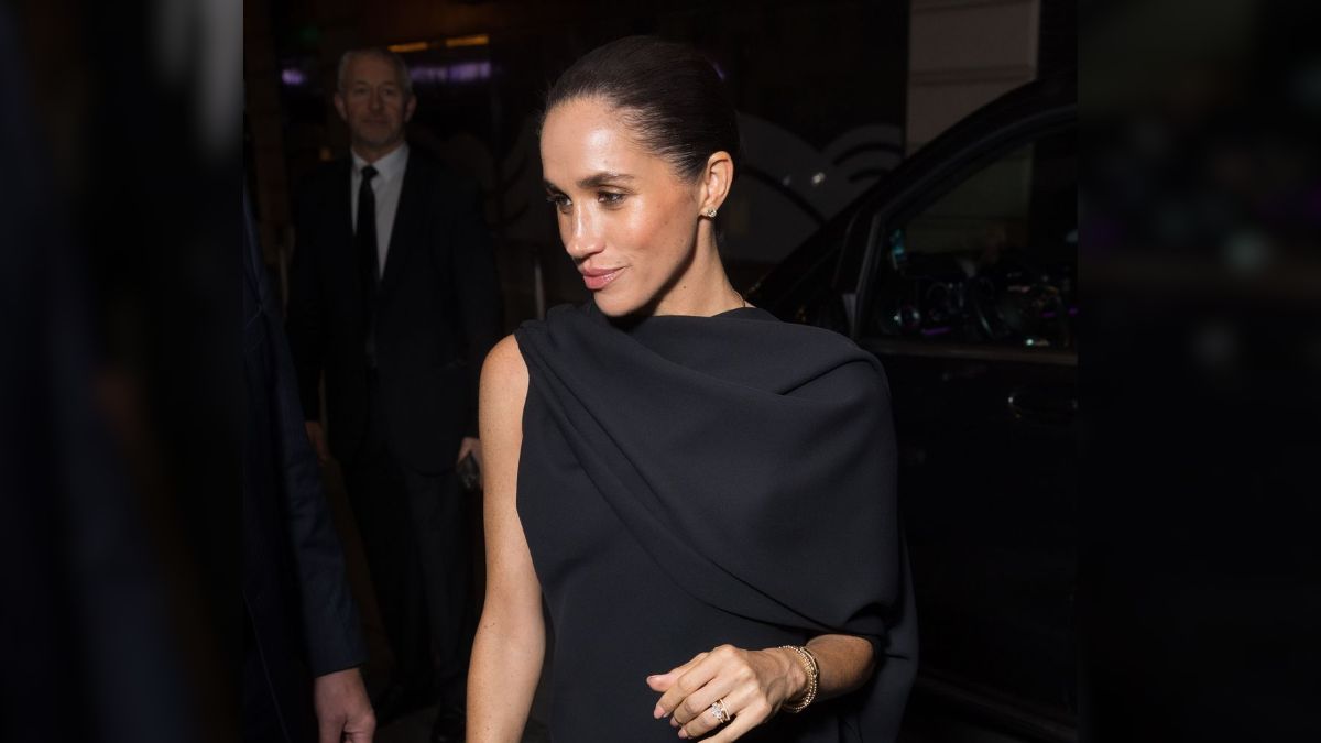 Meghan Markle Turns Heads with Dark, Chic Look at Paris Fashion Week