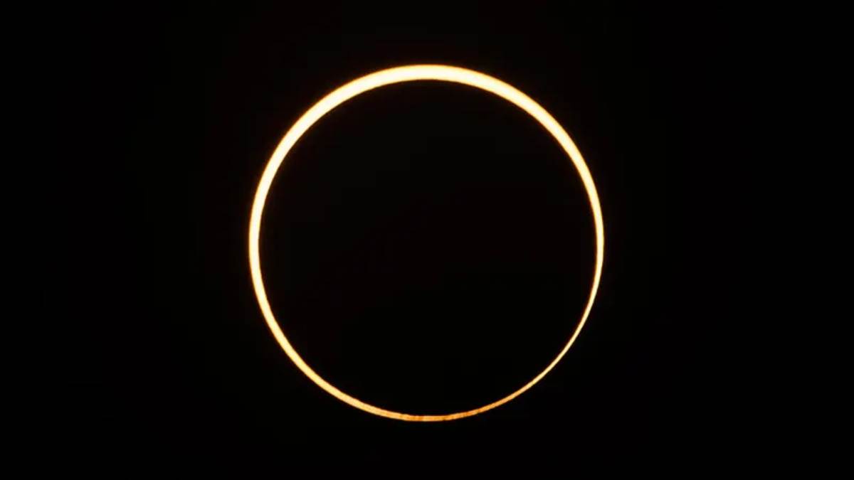 The moon moves in front of the sun in a rare "ring of fire" solar eclipse as seen from Singapore on December 26, 2019.