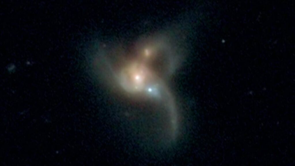 Astronomers Discover First-Ever Triple Active Black Hole System