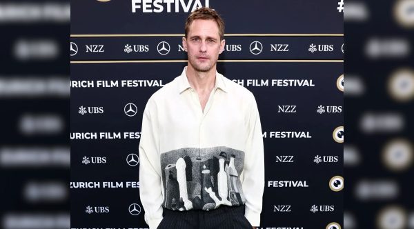 Alexander Skarsgård Wears NSFW Shirt at Pillion Photocall