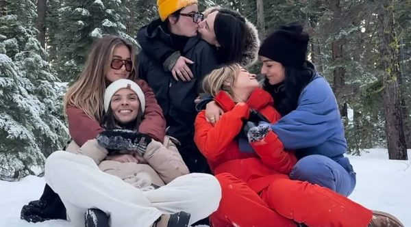 Kathryn Gallagher and Jacqueline Toboni kissing in the snow in December 2024