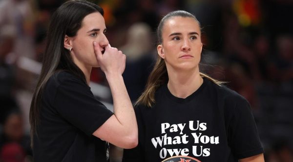 WNBA Players Wearing 'Pay Us' Tshirt